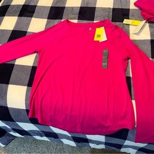 Women’s All In Motion t shirt. Sizes L and XL